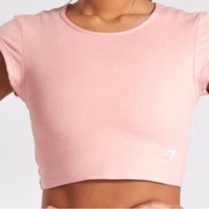 Gymshark Dreamy Sleeve Crop Top Women XS peach color
7 polyester 30 elastane